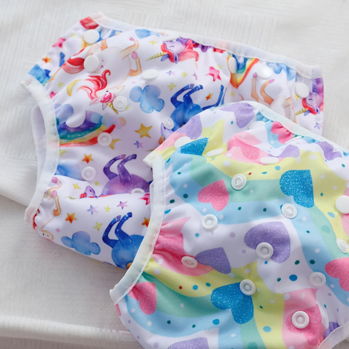 Baby Bubble washable baby swim diapers with adjustable fit, shown in blue, designed for comfortable and reusable swimwear for infants.