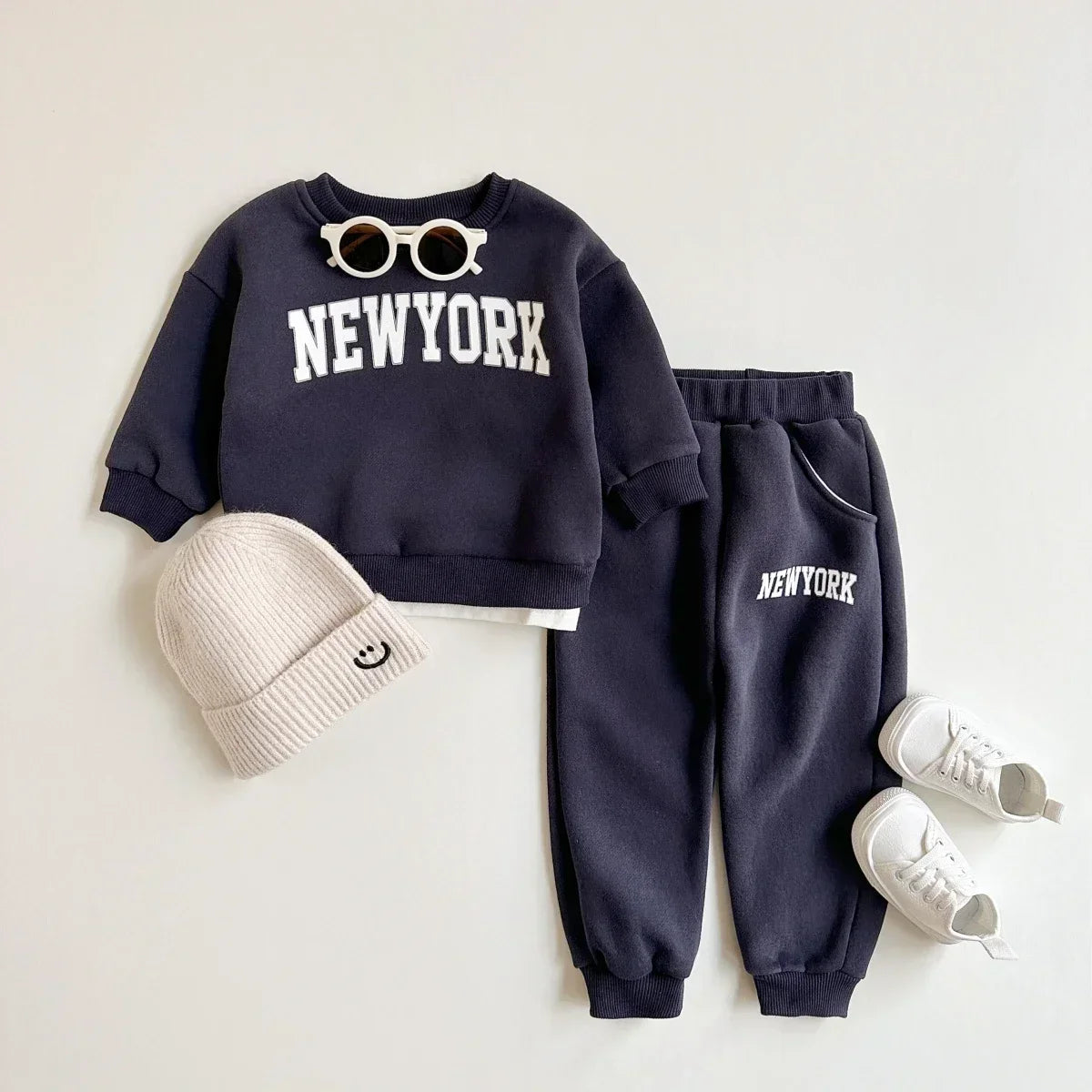 Baby Bubble winter baby outfit featuring a New York print top and matching pants, cozy and stylish for cold weather.
