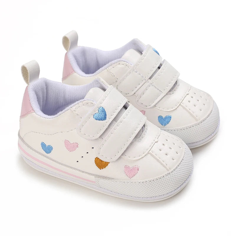 Baby girl soft sole crib shoes by Baby Bubble, first walker shoes with pink and white color, gentle sole for early walking.