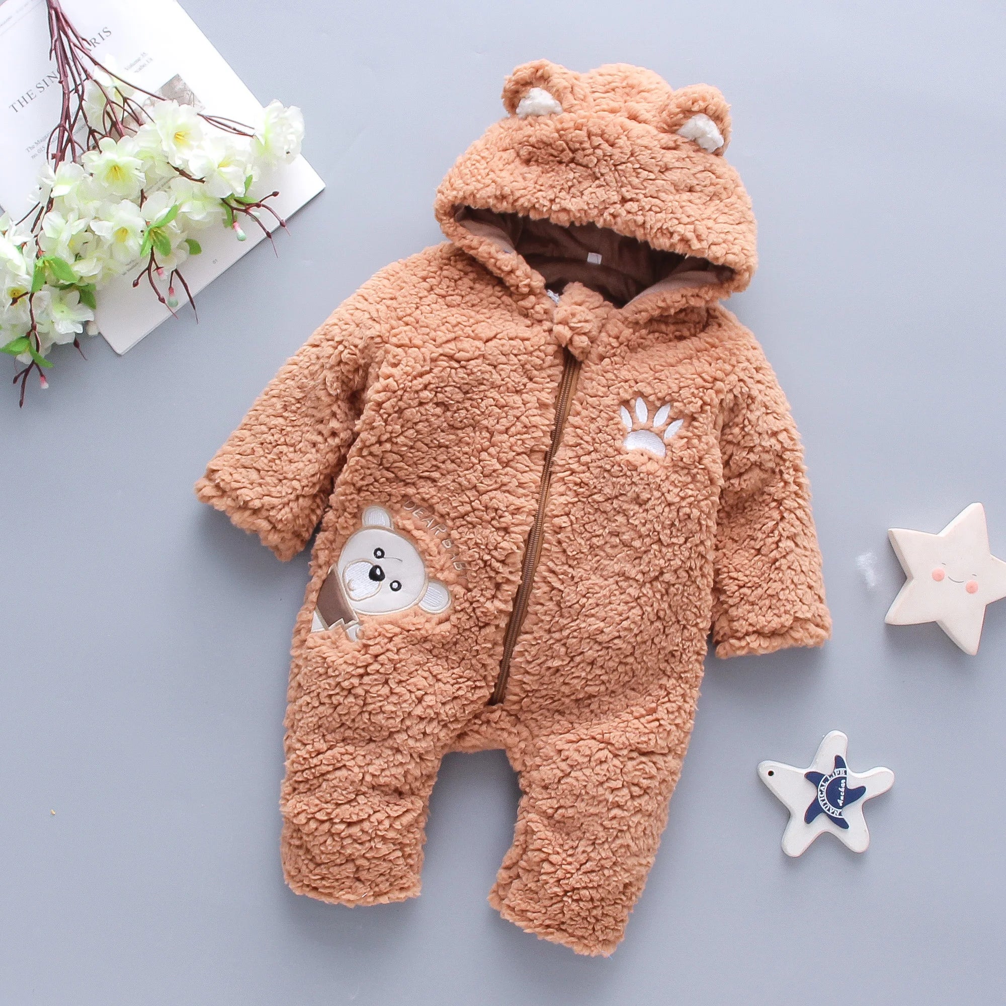 Soft fluffy lamb baby romper from Baby Bubble, a warm winter jumpsuit with cozy, plush fabric for infants.