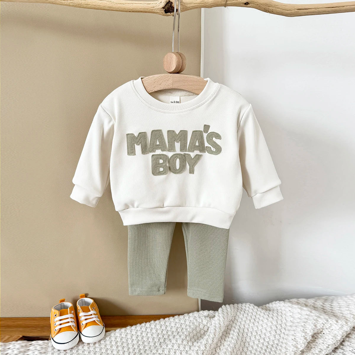 Baby Bubble MAMA'S BOY graphic sweatshirt set for babies, featuring a cozy warm suit with playful print and comfortable fabric.