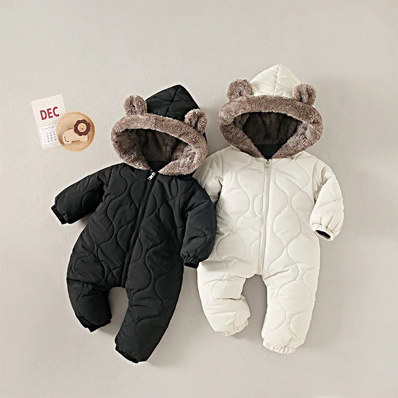 Baby Bubble winter jumpsuit with warm fur lining and cartoon print, designed for cozy, cold-weather comfort for infants.