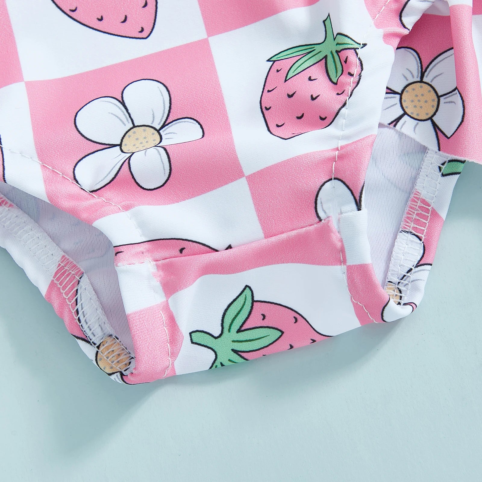 Baby girls floral rash guard with zip-up front and matching hat by Baby Bubble, perfect for sun protection and outdoor play.