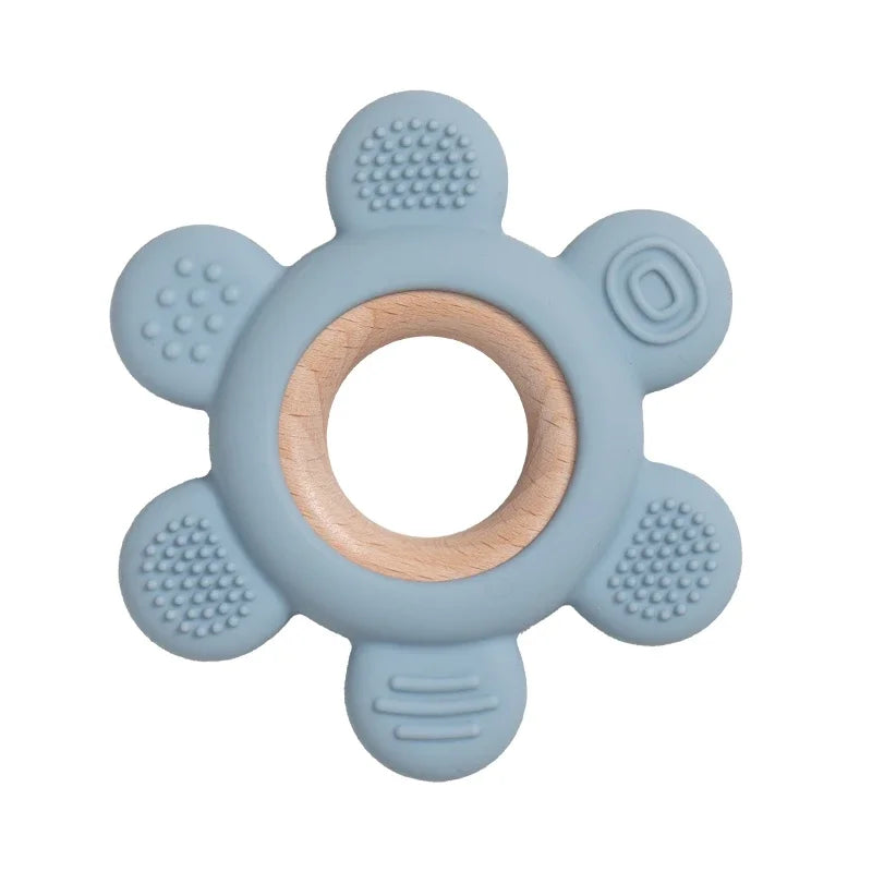 Baby Bubble silicone wood teether ring with smooth, rounded edges and colorful beads for soothing baby’s gums and teething comfort.