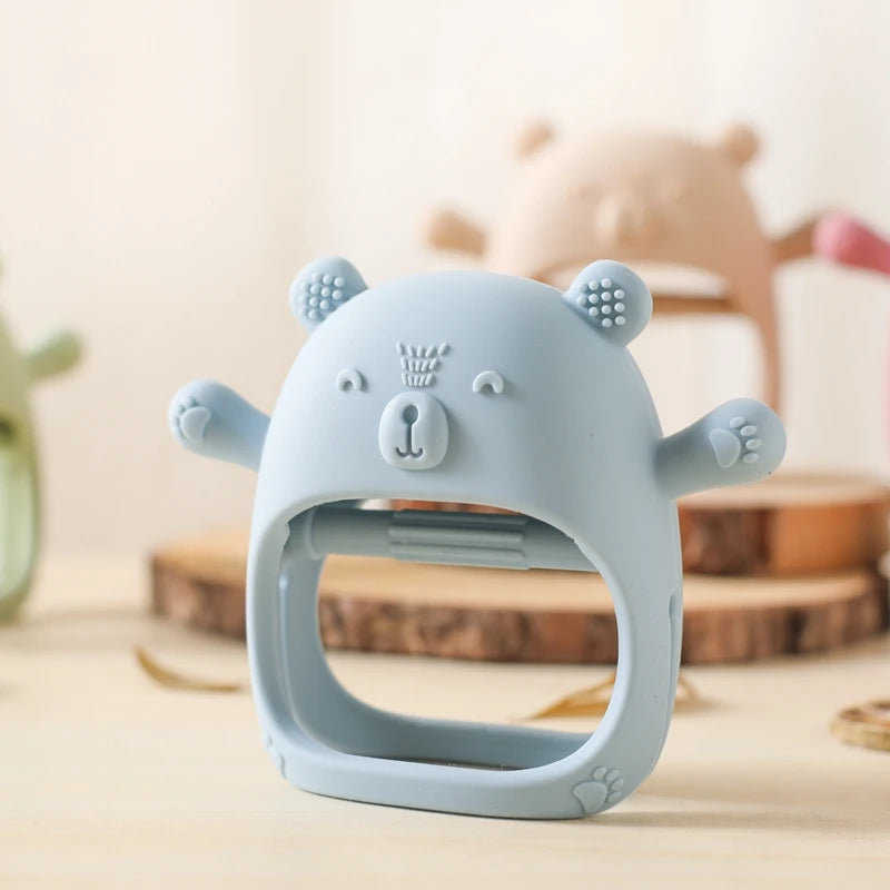 Baby Bubble BPA-free silicone baby teether glove with textured surface for gum relief, designed to soothe teething discomfort.