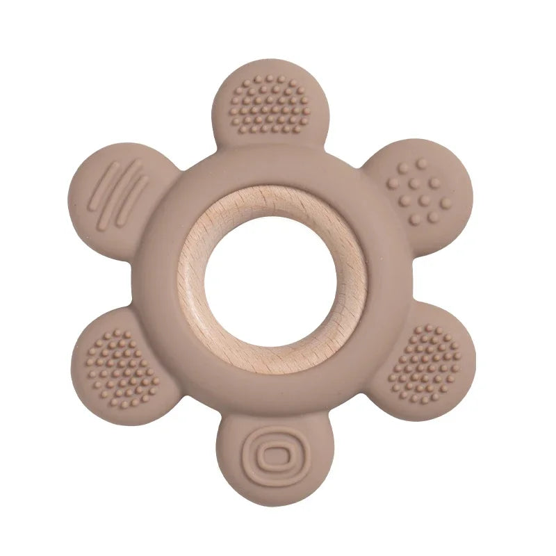Baby Bubble silicone wood teether ring with natural wood and soft silicone, designed as a safe soothing chew toy for babies.