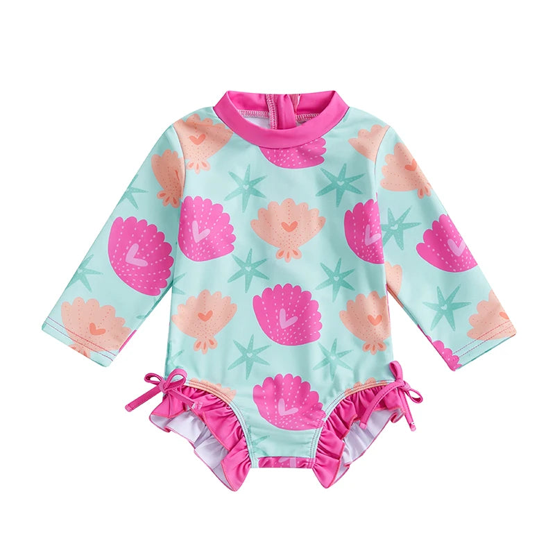 Baby Girl's rash guard swimsuit with shell print, UV protection from Baby Bubble, suitable for swimming and outdoor sun protection.