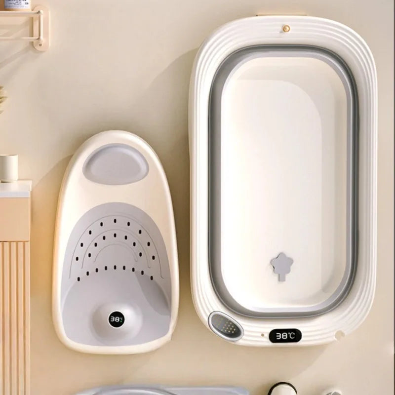 Foldable Baby Bath Tub with temperature sensor from Baby Bubble, showing soft plastic surface and foldable design for easy storage.