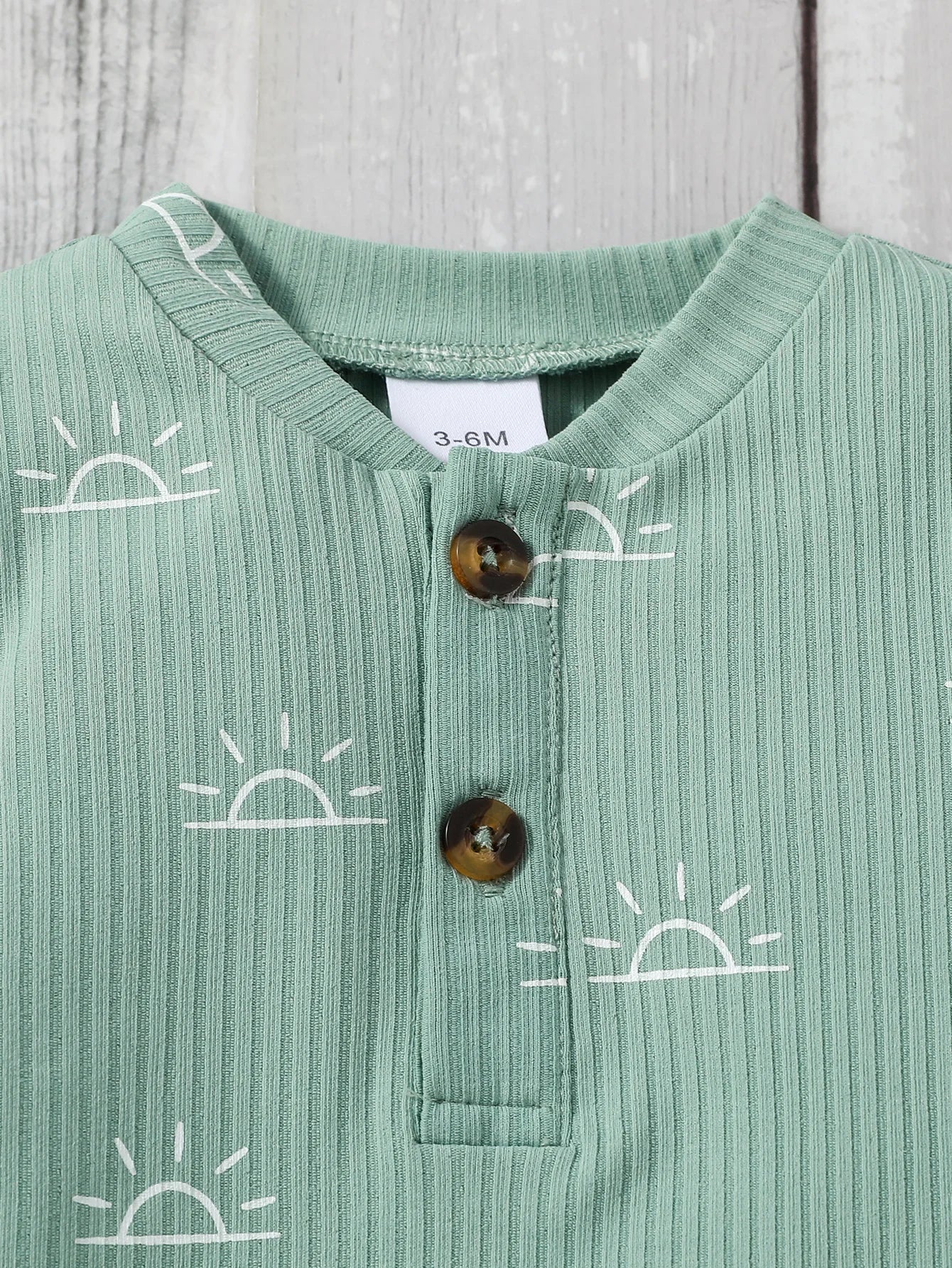 Baby Boy 2-piece outfit by Baby Bubble featuring a cute jumpsuit and matching pants, perfect for little boys.