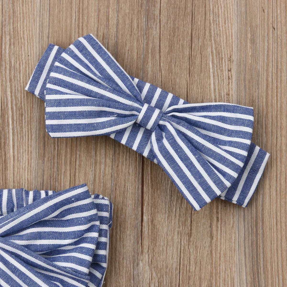 Baby Girl Summer Romper by Baby Bubble featuring a cute striped design, perfect for warm weather and comfortable wear.