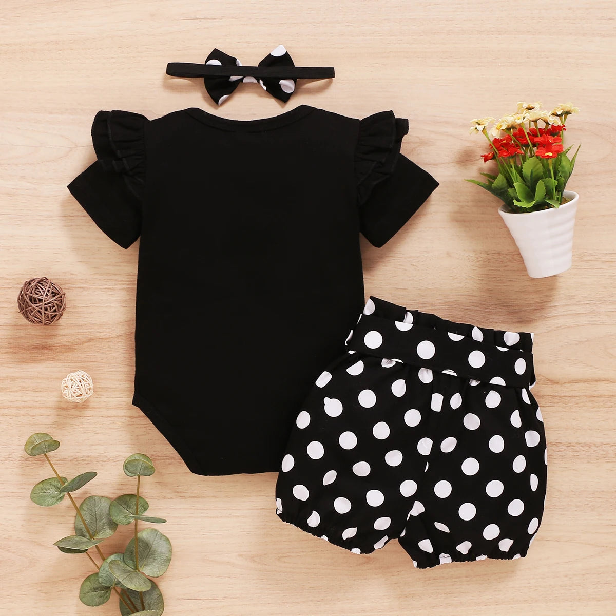 Baby Girl Summer Set by Baby Bubble, 3-piece outfit with colorful top, shorts, and hat for warm weather.