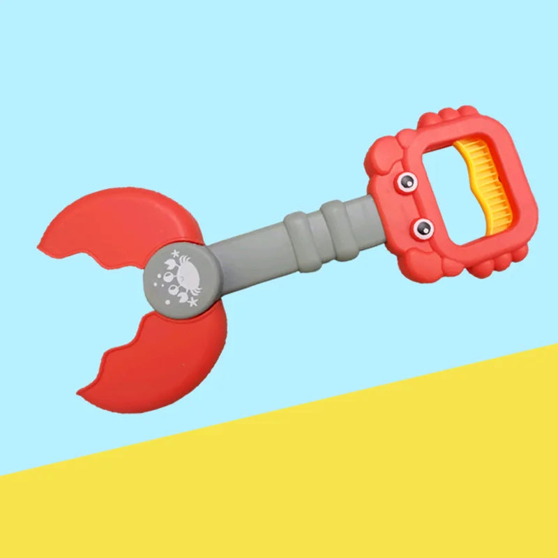 Kids beach sand toy set with colorful buckets, shovels, and molds for outdoor summer play, designed for children by Baby Bubble.
