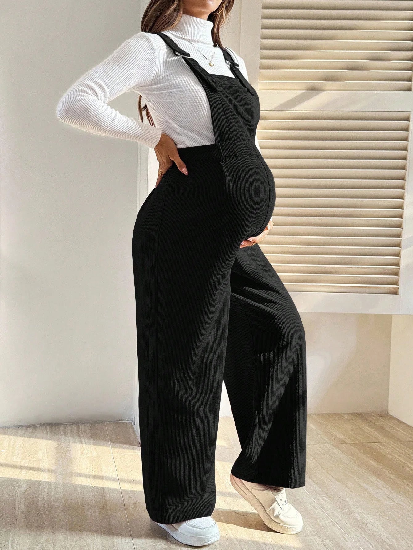 Baby Bubble maternity corduroy jumpsuit with suspender pants, featuring a comfortable, stylish design for expecting mothers.