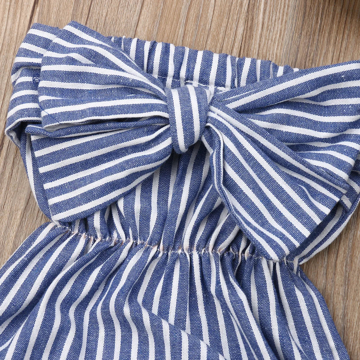 Baby Girl summer romper by Baby Bubble with adorable stripe design, lightweight and comfortable for warm weather.