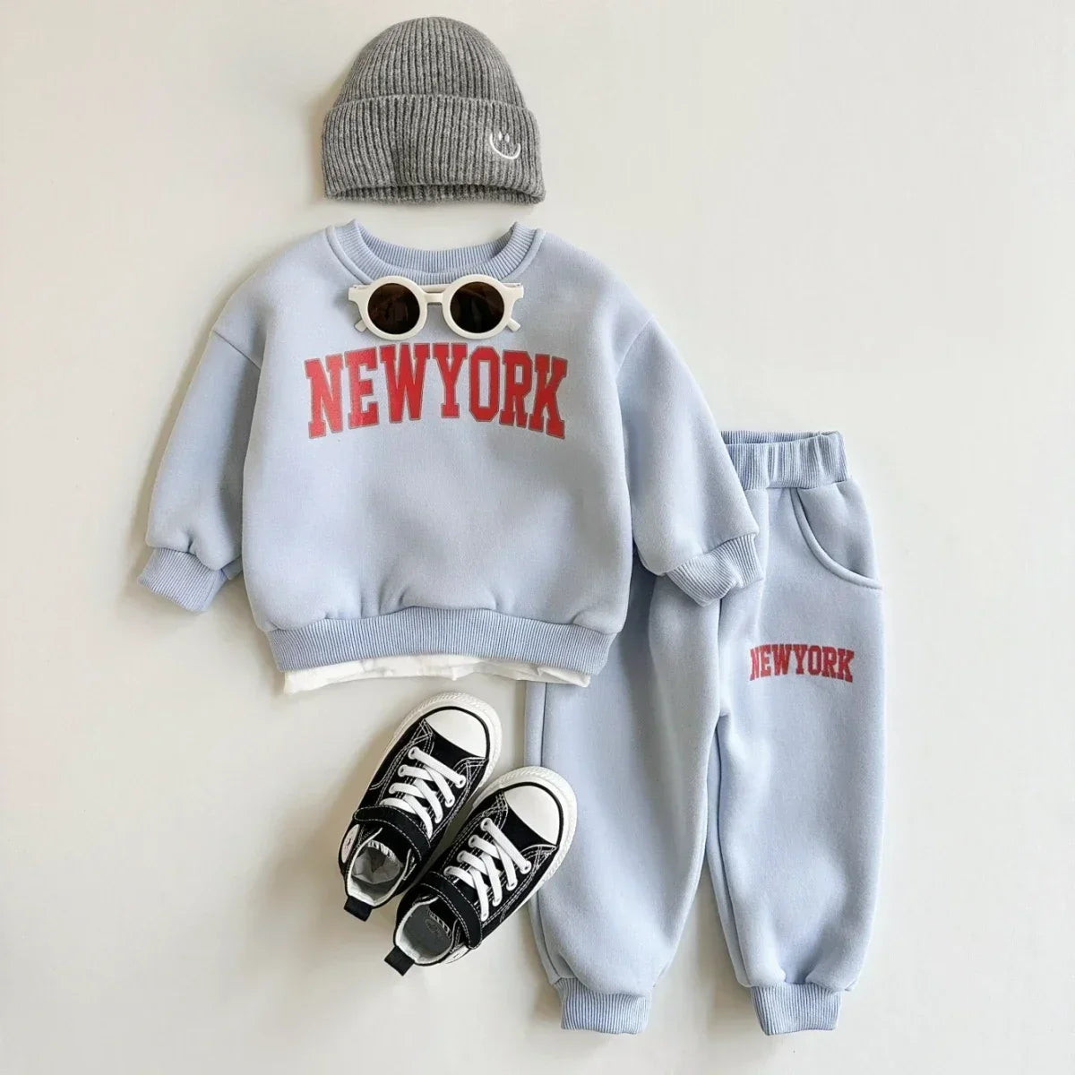 Baby Bubble winter outfit featuring a New York print top and matching pants, cozy and stylish for babies.