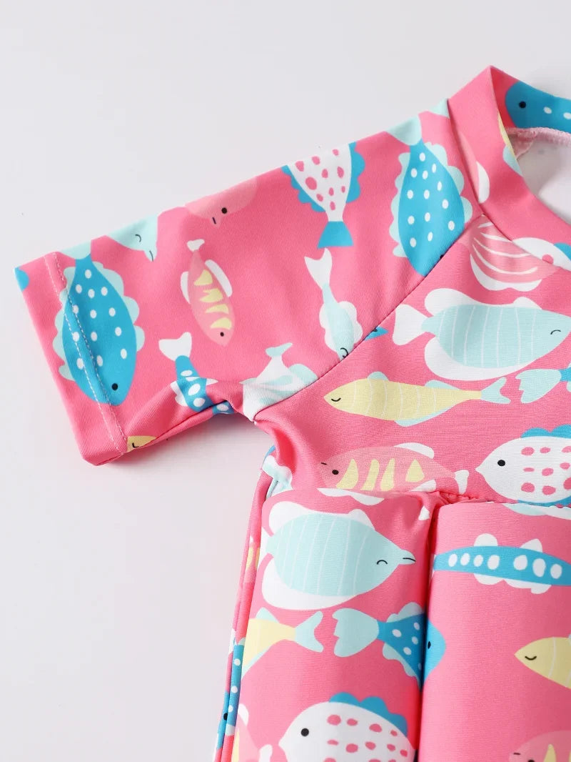 Kids buoyancy swimsuit with cartoon float design by Baby Bubble, featuring colorful, safe swimwear for children with built-in flotation.