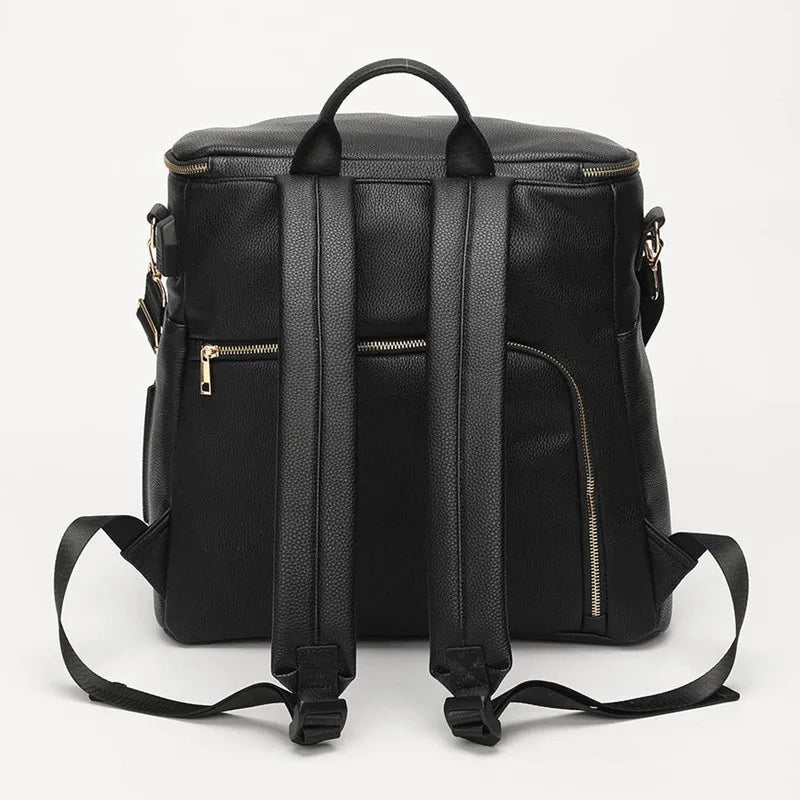 Baby Bubble PU leather diaper bag with multiple compartments, travel-ready design, and stylish appearance for parents on the go.
