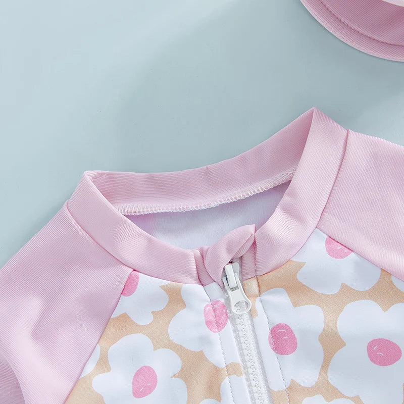 Baby girls rash guard set with floral and flamingo print by Baby Bubble, featuring a colorful, lightweight swimwear outfit.
