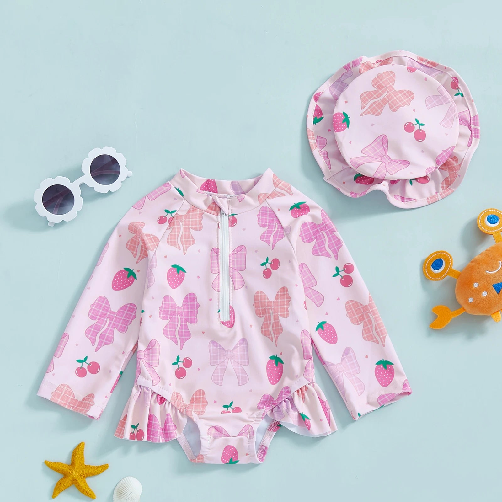 Baby girls floral rash guard with hat by Baby Bubble, featuring a zip-up design and colorful floral pattern for sun protection.