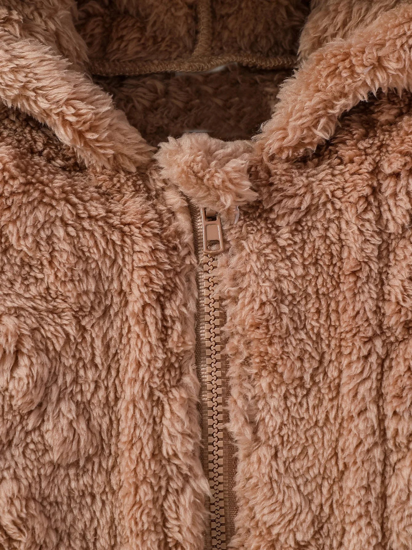 Baby Boy's winter hooded jumpsuit by Baby Bubble, cozy and warm, shown in a soft, plush fabric with a hood and full-length zipper.