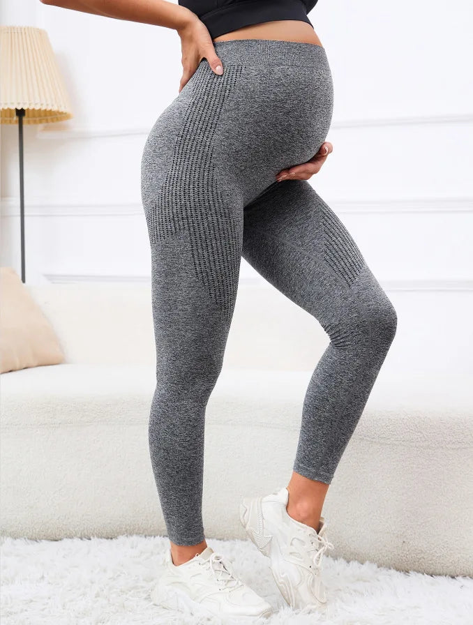 High waist maternity leggings by Baby Bubble with belly support, shown in black, designed for comfort and all-day wear.