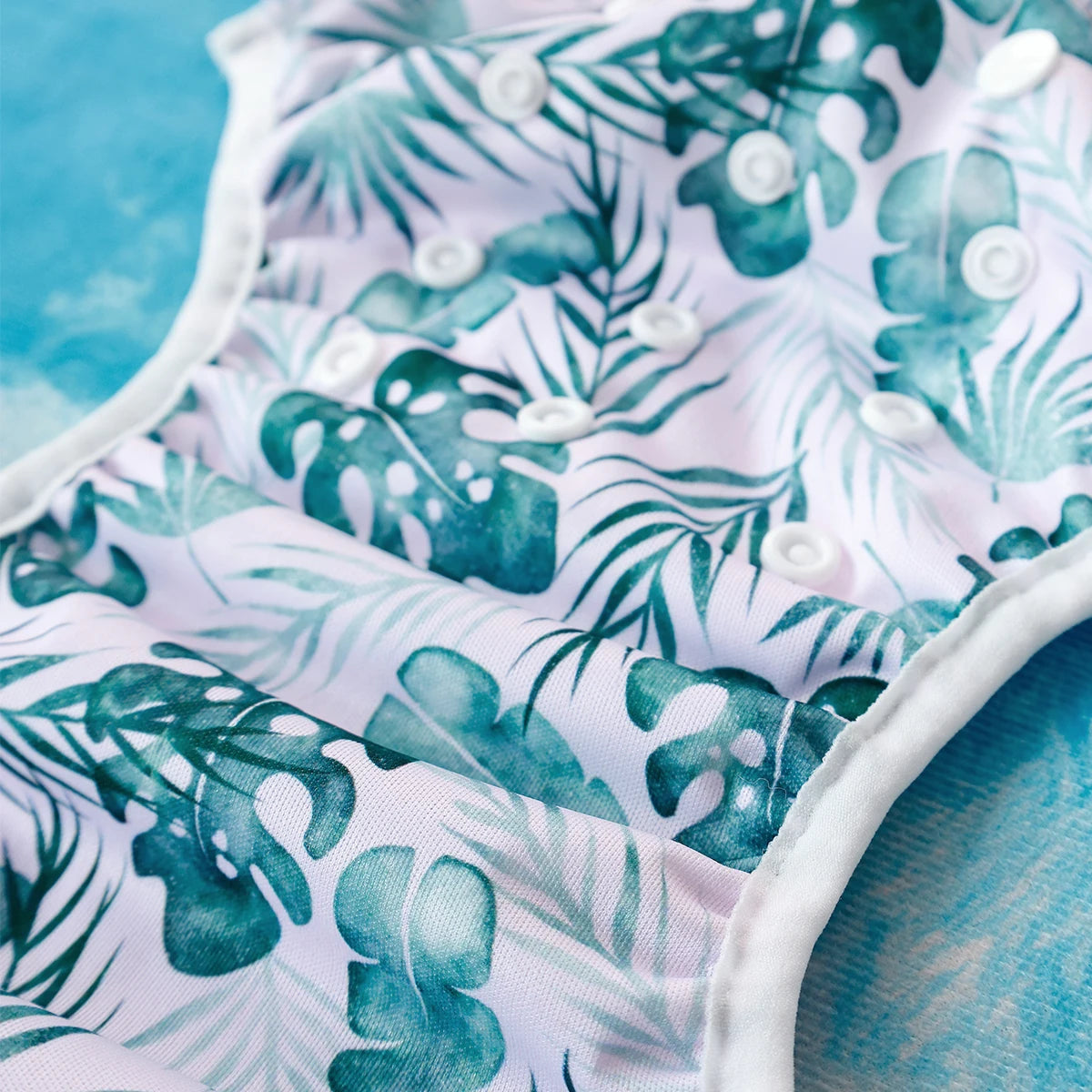 Baby Bubble washable baby swim diapers with adjustable fit, shown in a colorful design for comfortable water play.