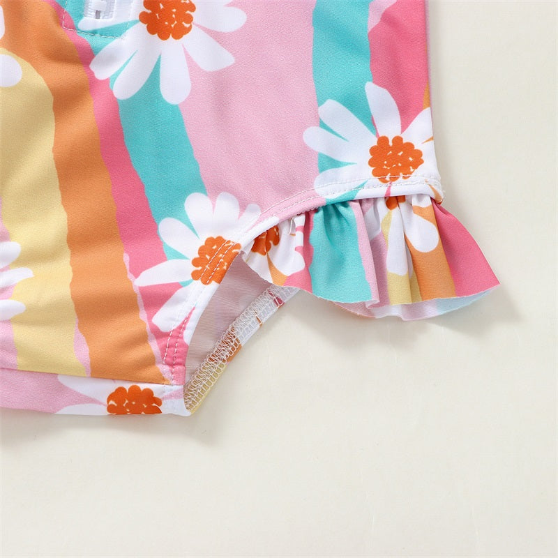 Baby Girl UV swimsuit with long sleeves and hat by Baby Bubble, featuring a zipper and sun protection for infants.