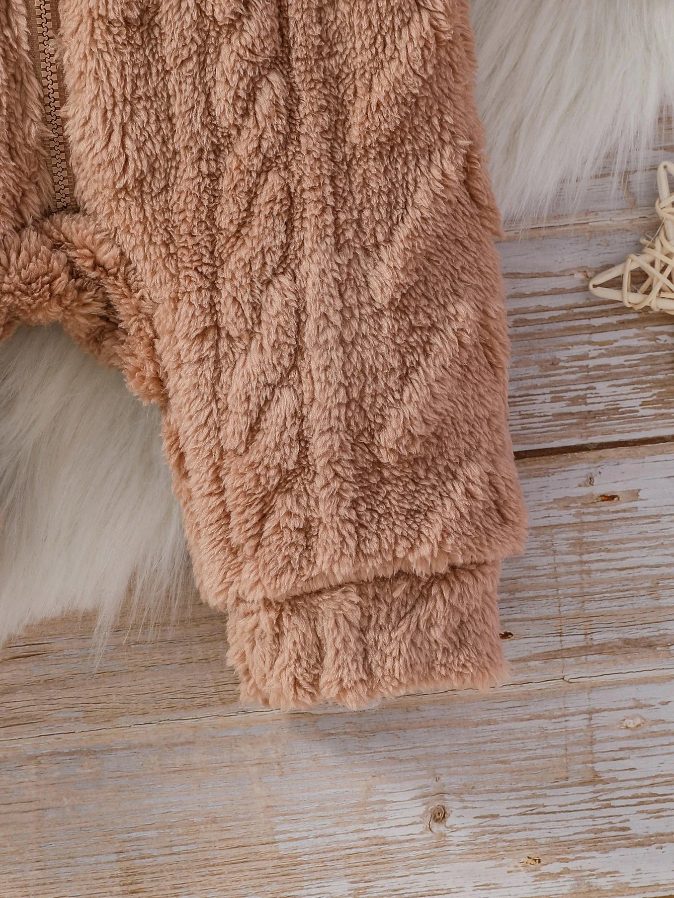 Baby Boy's winter hooded jumpsuit by Baby Bubble, cozy and warm, with a soft hood and snug fit for cold weather.