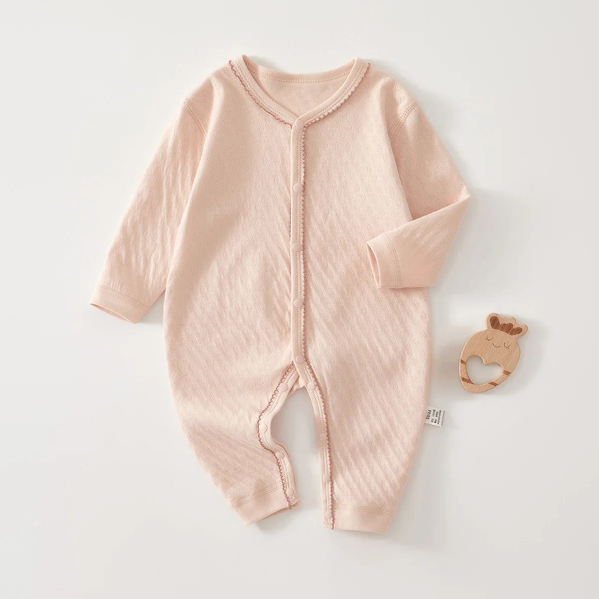 Baby Bubble pure cotton hooded jumpsuit for newborns, featuring soft fabric and a cozy hood for comfortable wear.