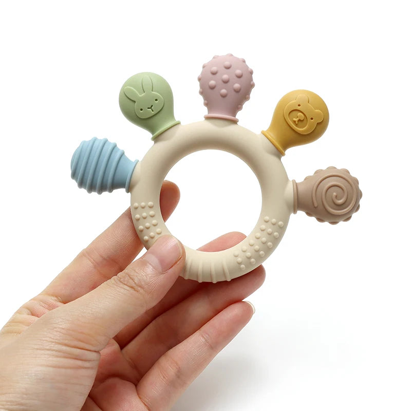 Colorful silicone baby ring teether from Baby Bubble, designed as a gum soother for soothing and teething relief.