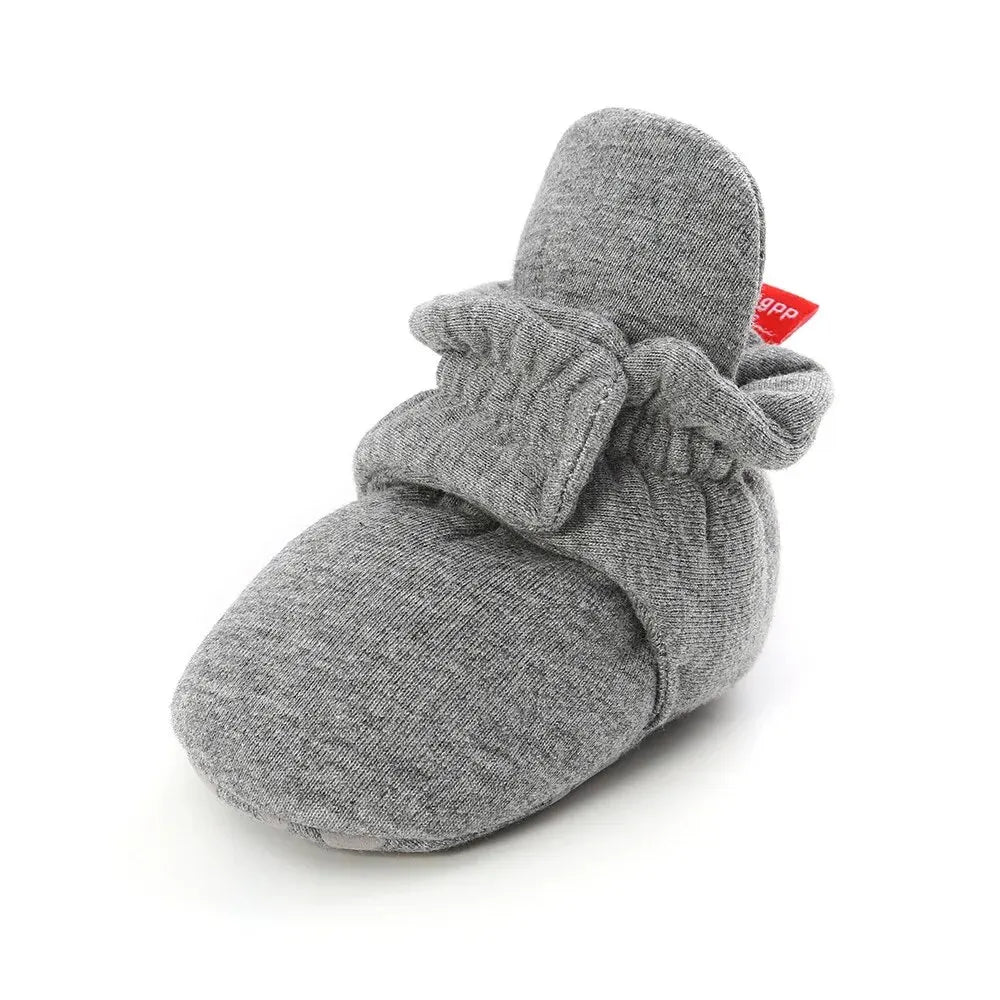 Baby Bubble soft anti-slip star booties for babies, featuring a comfortable design and cute star details, perfect for first steps.