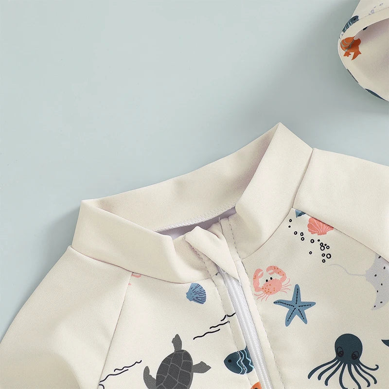 Baby boys rash guard set by Baby Bubble featuring marine animal print, short sleeves and sun protection for swimming and outdoor play.