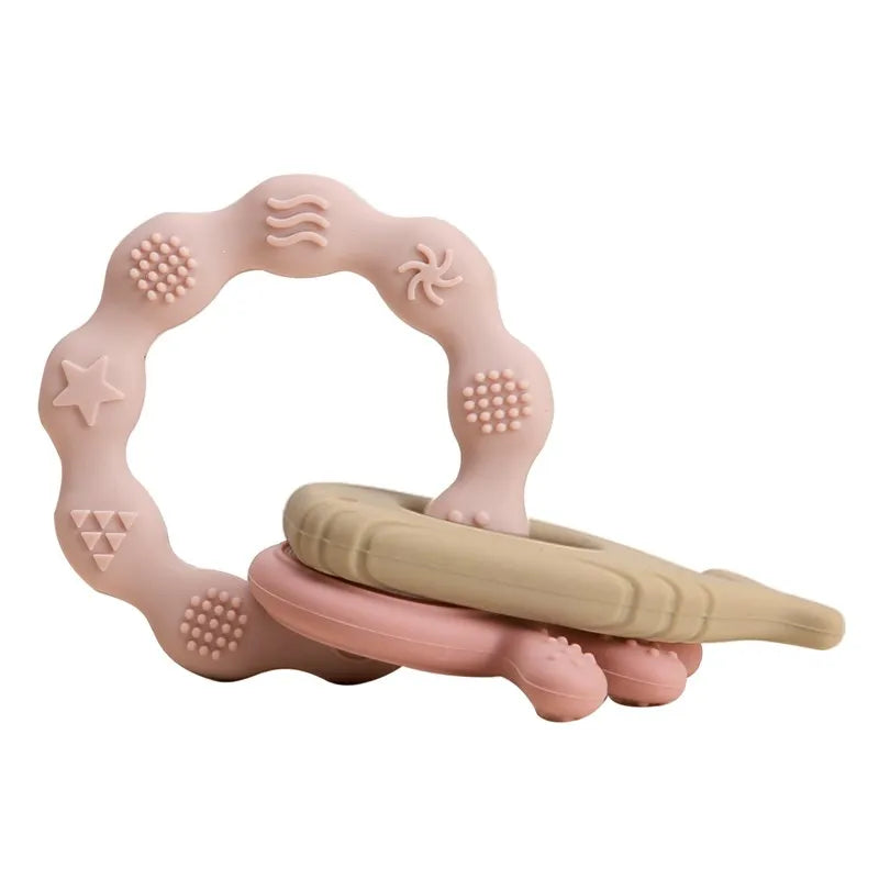 Baby Bubble BPA-free silicone teether glove with textured surface for soothing baby's gums, designed as a soft gum relief toy.