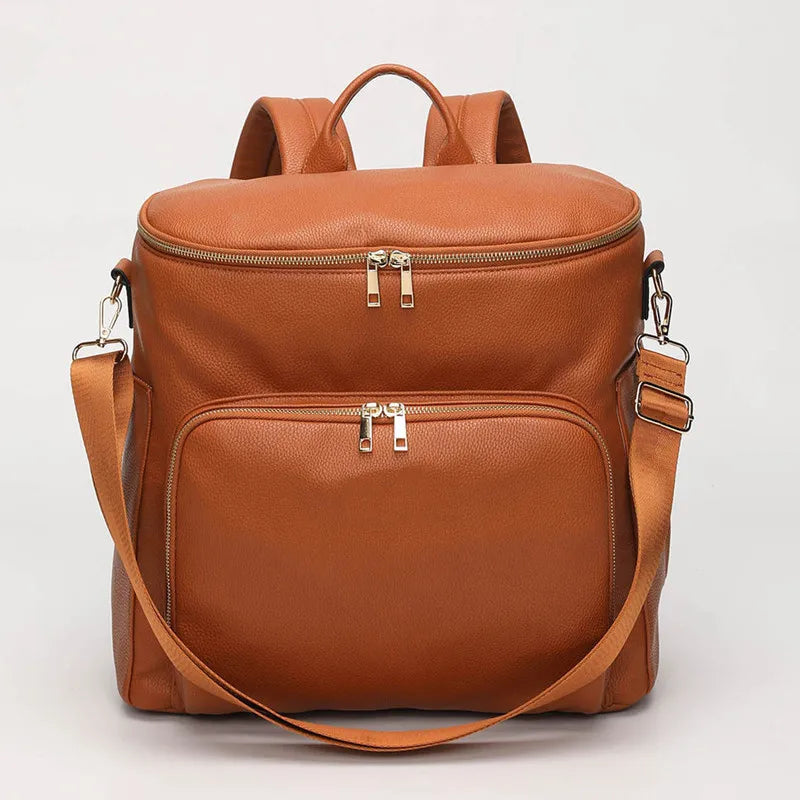 Baby Bubble PU leather diaper bag, travel-ready with multiple compartments, stylish design, and durable material for on-the-go parents.
