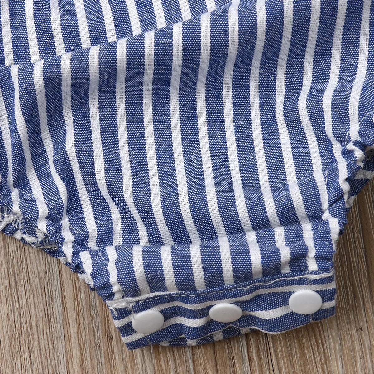 Baby Girl Summer Romper by Baby Bubble with cute stripe design, lightweight and perfect for warm weather.