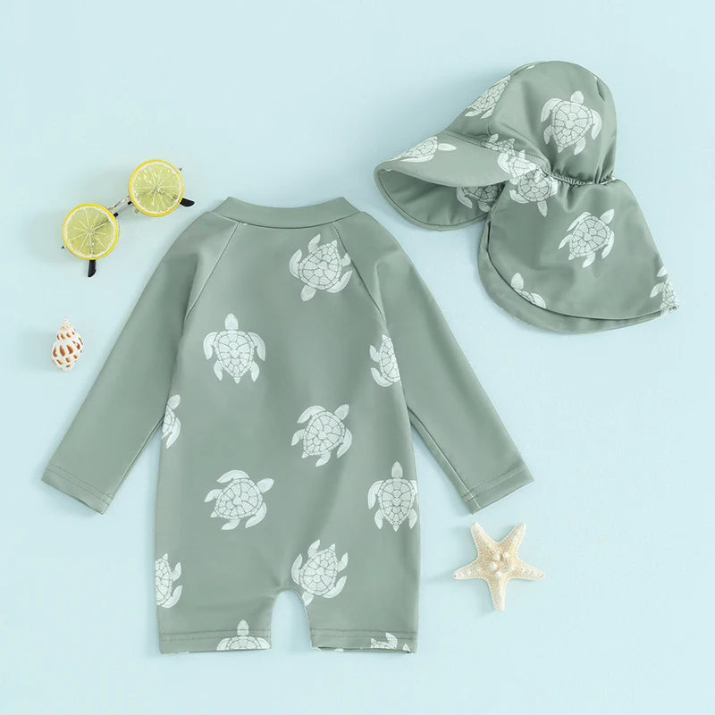 Baby boys rash guard set with turtle and dinosaur print by Baby Bubble, featuring colorful, lightweight sun protection for infants.