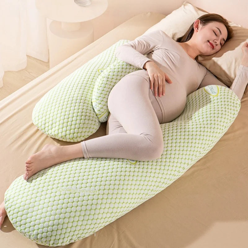 U-shaped pregnancy pillow by Baby Bubble providing full body sleep support, shown in soft fabric with contoured design.