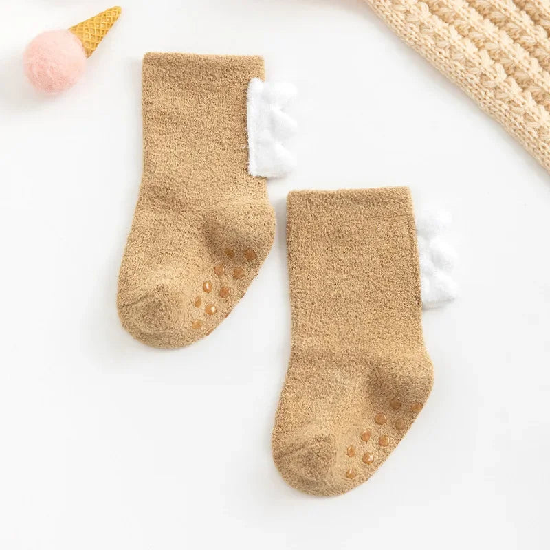 Baby Dinosaur Socks by Baby Bubble, soft and warm baby socks featuring colorful dinosaur designs for infants.
