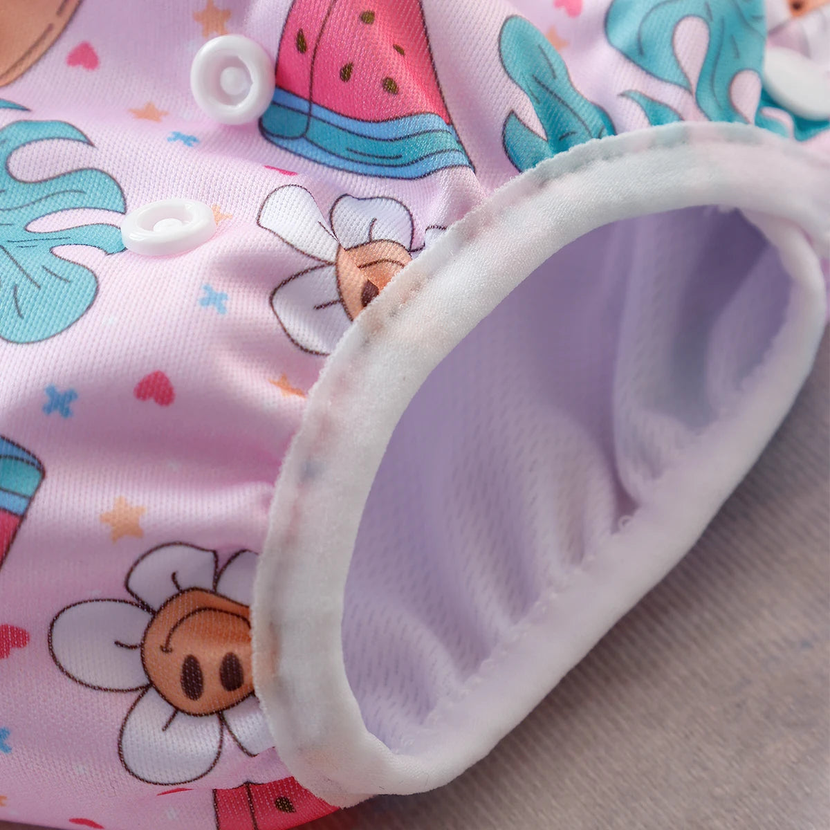 Baby Bubble washable baby swim diapers with adjustable fit, shown in navy blue, designed for comfortable water play.