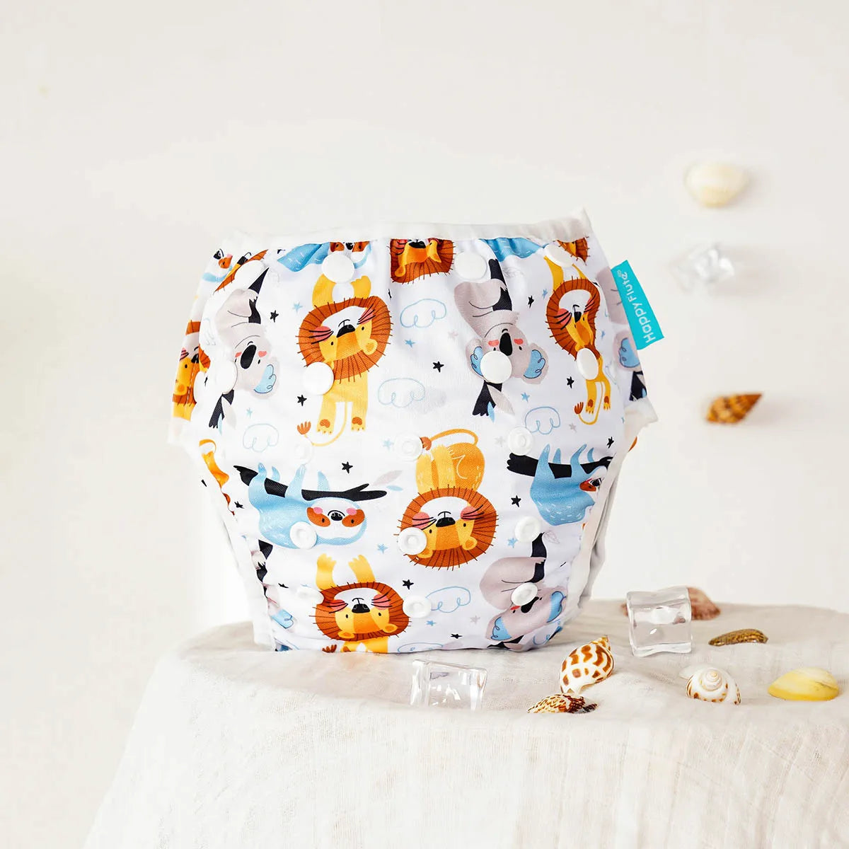 Reusable baby swim diapers with colorful animal print from Baby Bubble, designed for comfortable swimming and water play.