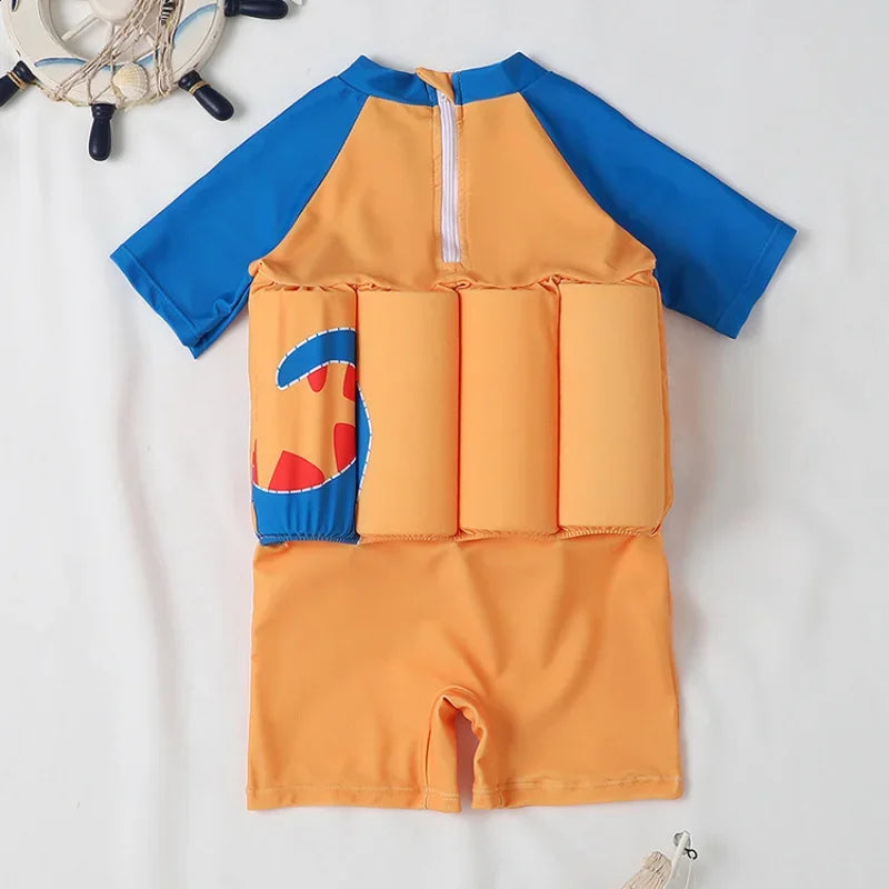 Kids buoyancy swimsuit by Baby Bubble featuring colorful cartoon float design, ideal for safe swimming and water play.