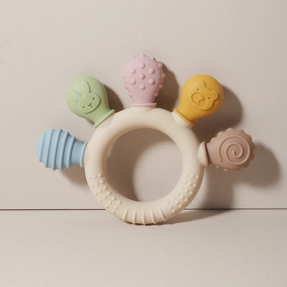Colorful silicone baby ring teether from Baby Bubble, designed as a gum soother for soothing teething discomfort in infants.
