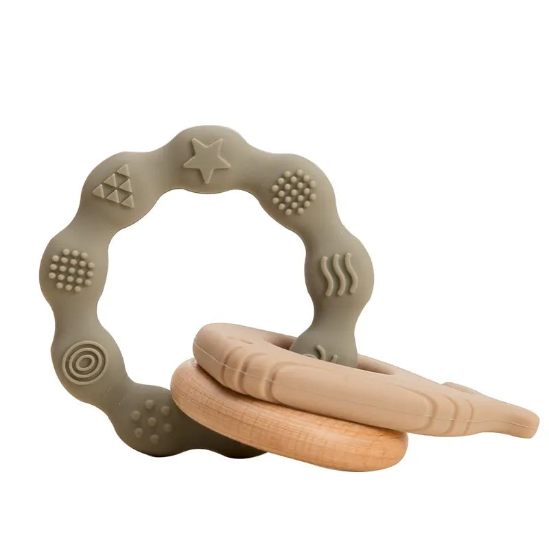 Baby Bubble BPA-free silicone teether glove designed for gum relief, with textured surface for soothing baby’s gums.