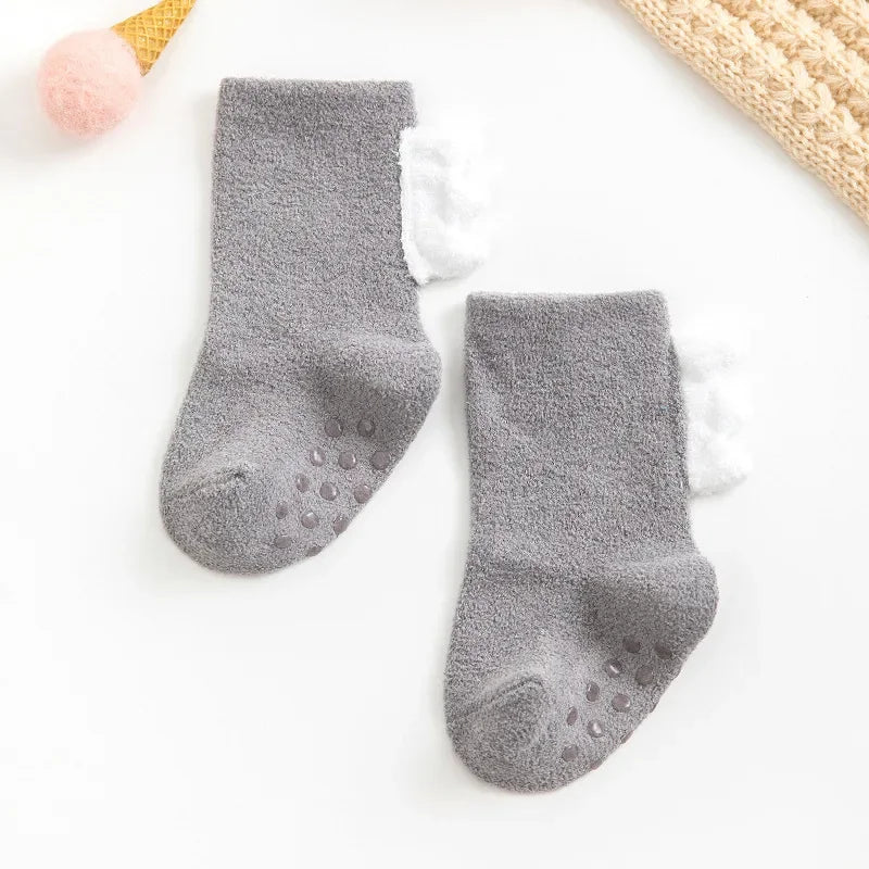Baby Dinosaur Socks by Baby Bubble, soft and warm baby socks featuring colorful dinosaur designs for infants.
