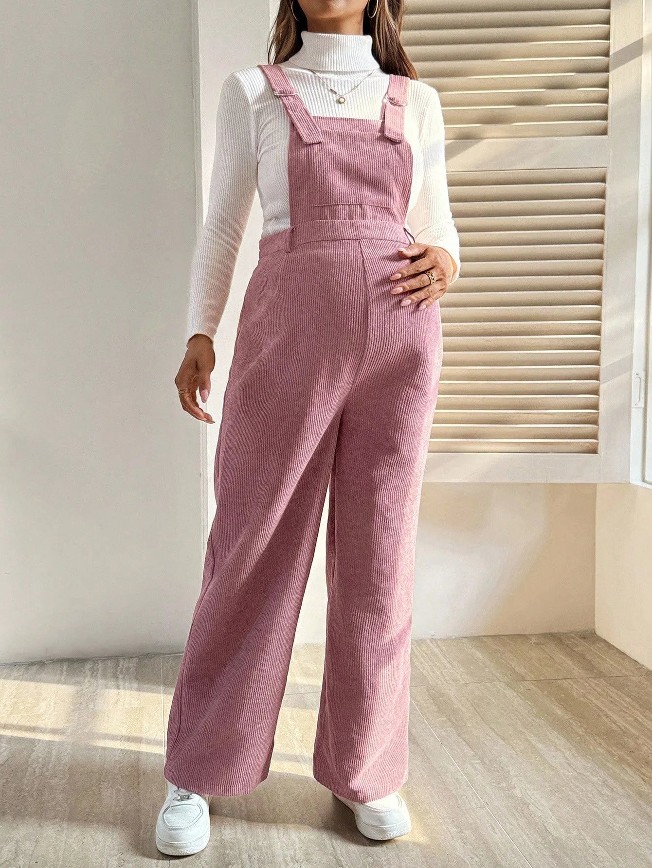 Baby Bubble maternity corduroy jumpsuit with suspenders, showcasing a stylish and comfortable pregnancy outfit in soft fabric.