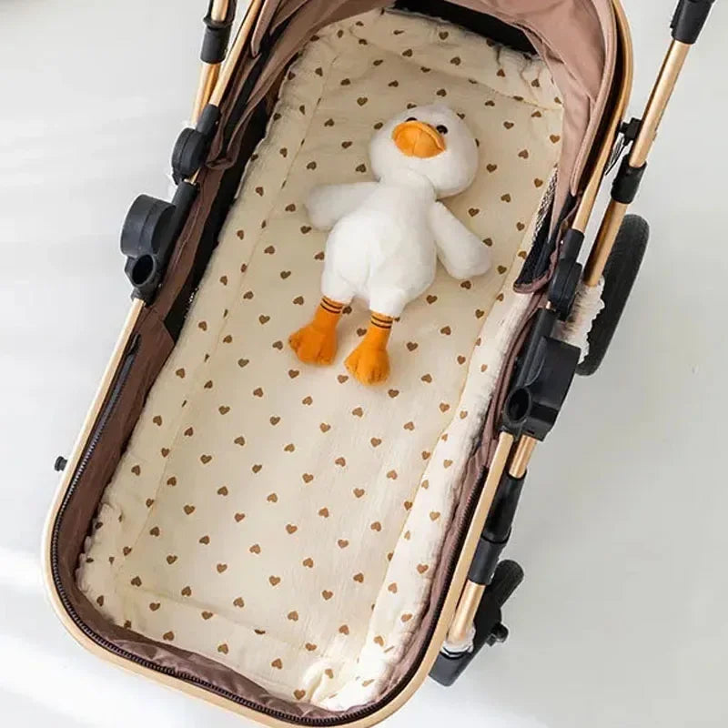 Baby Bubble soft cartoon shoulder pad for stroller straps, providing comfort and cushioning for baby’s shoulders.