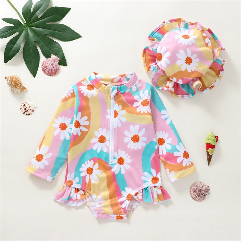 Baby Girl UV swimsuit with long sleeves and hat by Baby Bubble, featuring a zipper for easy wear and sun protection.