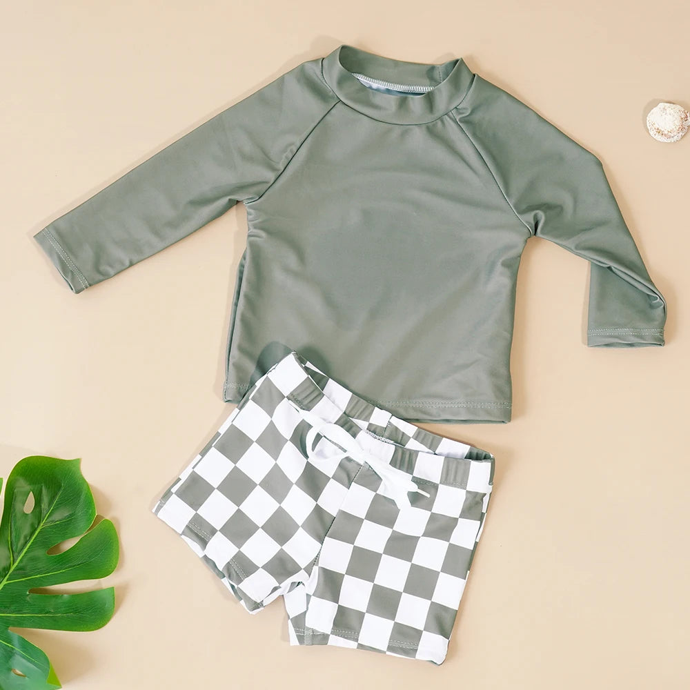 Baby boys' 2-piece swimsuit set by Baby Bubble featuring a cool print, with a tank top and swim trunks for summer fun.
