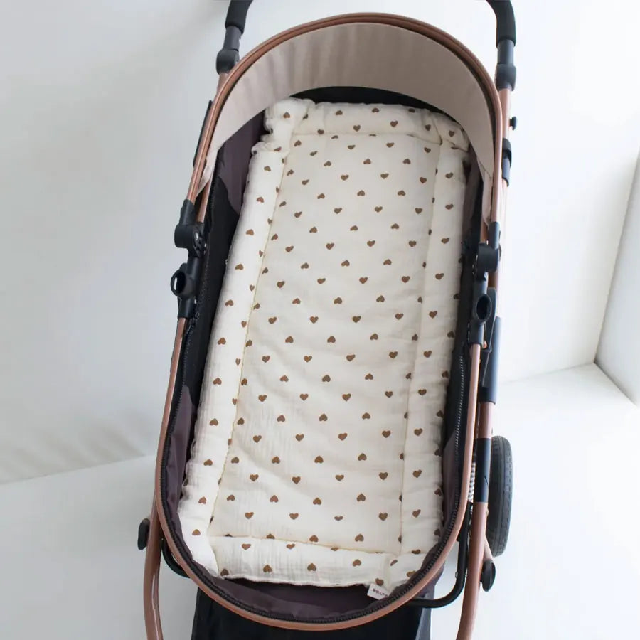 Soft cartoon-themed baby stroller strap cover by Baby Bubble, providing comfort and protection for shoulder straps.