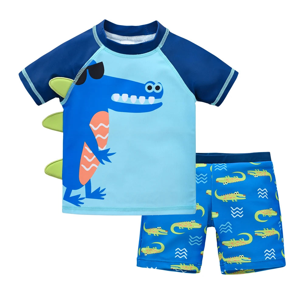 Boy wearing a Baby Bubble boys' 2-piece swimsuit set with a cool print, suitable for ages 1 to 7, outdoors in sunny weather.